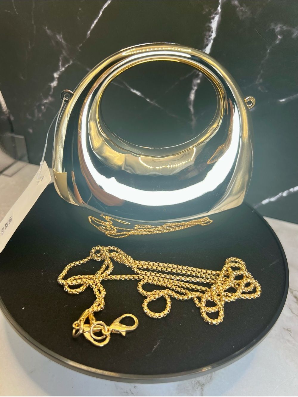 Metallic Gold tone acrylic mirror crescent moon handbag. detachable chain strap